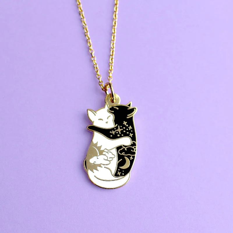 Day & Night Hugging Cats Necklace