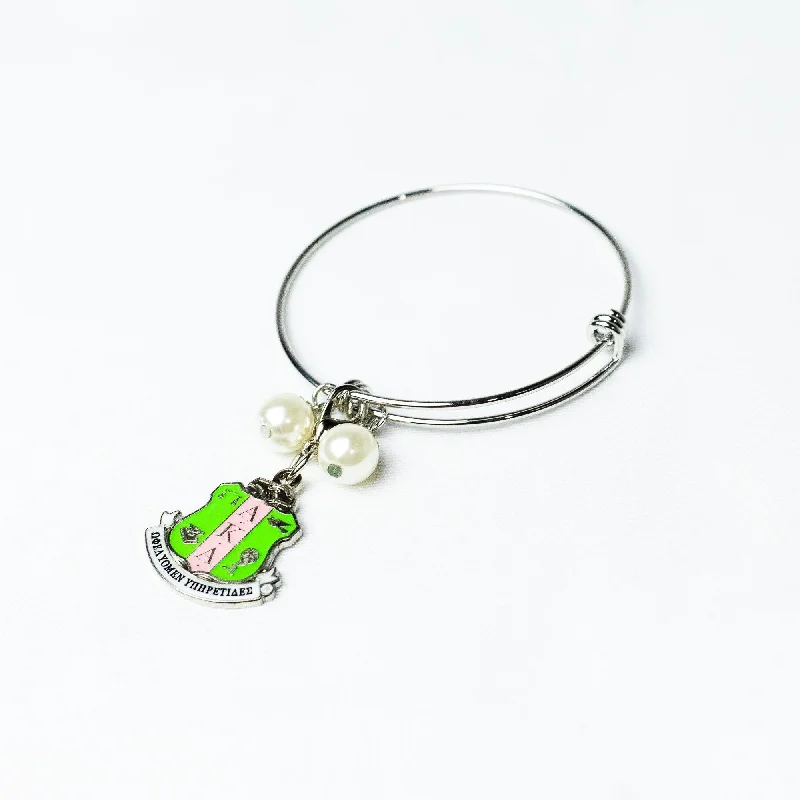 AKA Silver Wire Bracelet with Silver Shield Charm