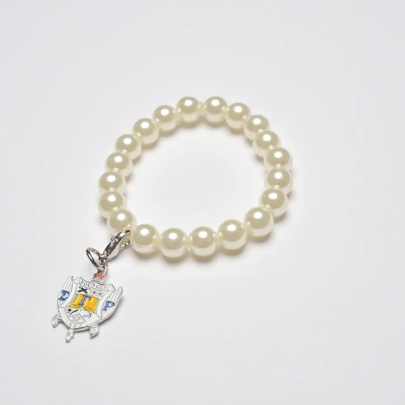 Pearl Bracelet with ΣΓΡ Shield Charm